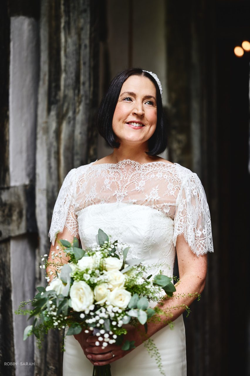 Portrait of bride standing in beautiful light at Greyfriars