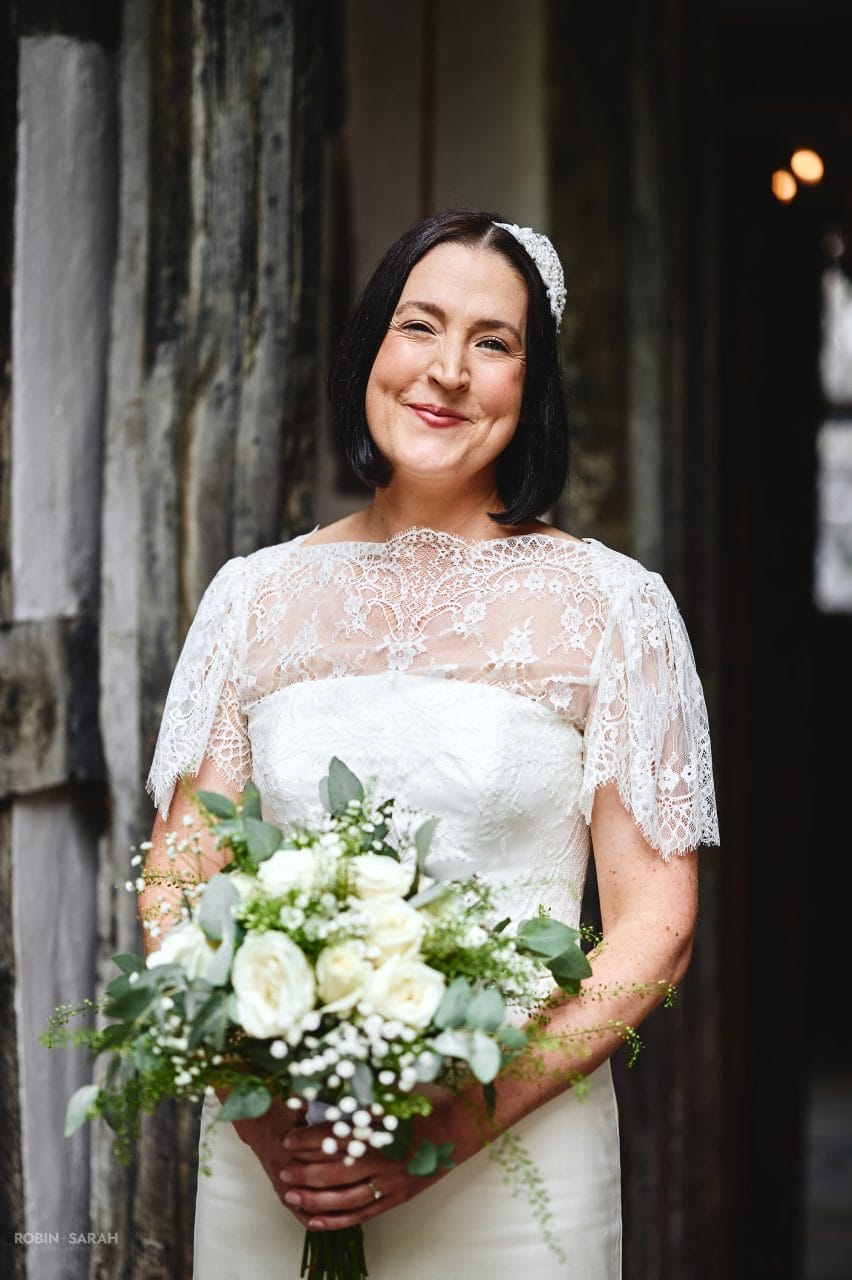 Portrait of bride holding bouquet at Greyfriars in Worcester