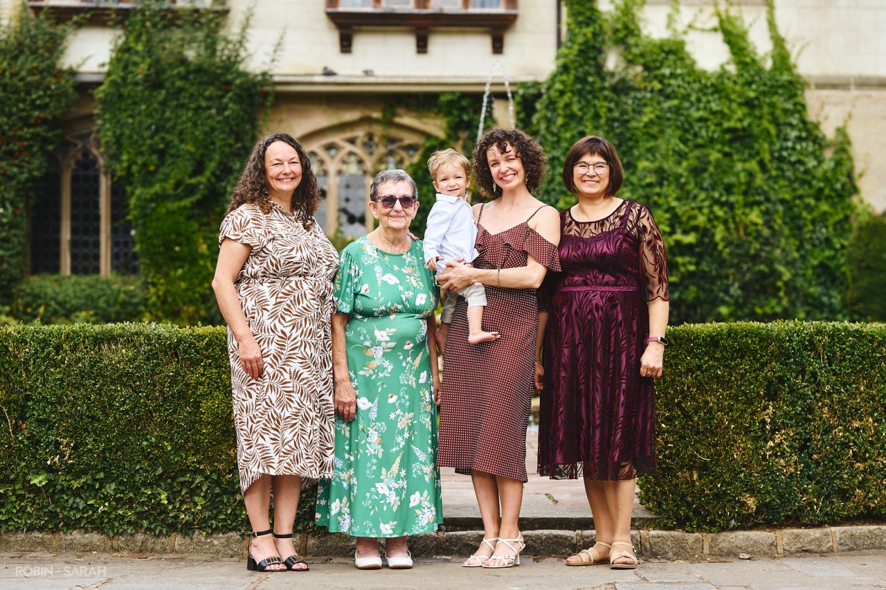 Group photo of female family members and child at Christening party at Coombe Abbey