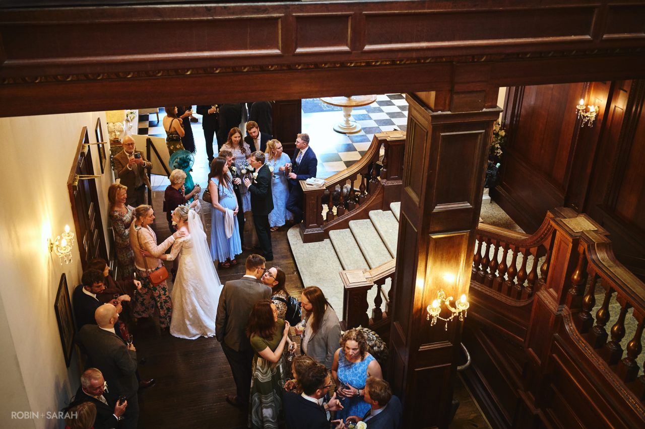 Bride chats with wedding guests during reception