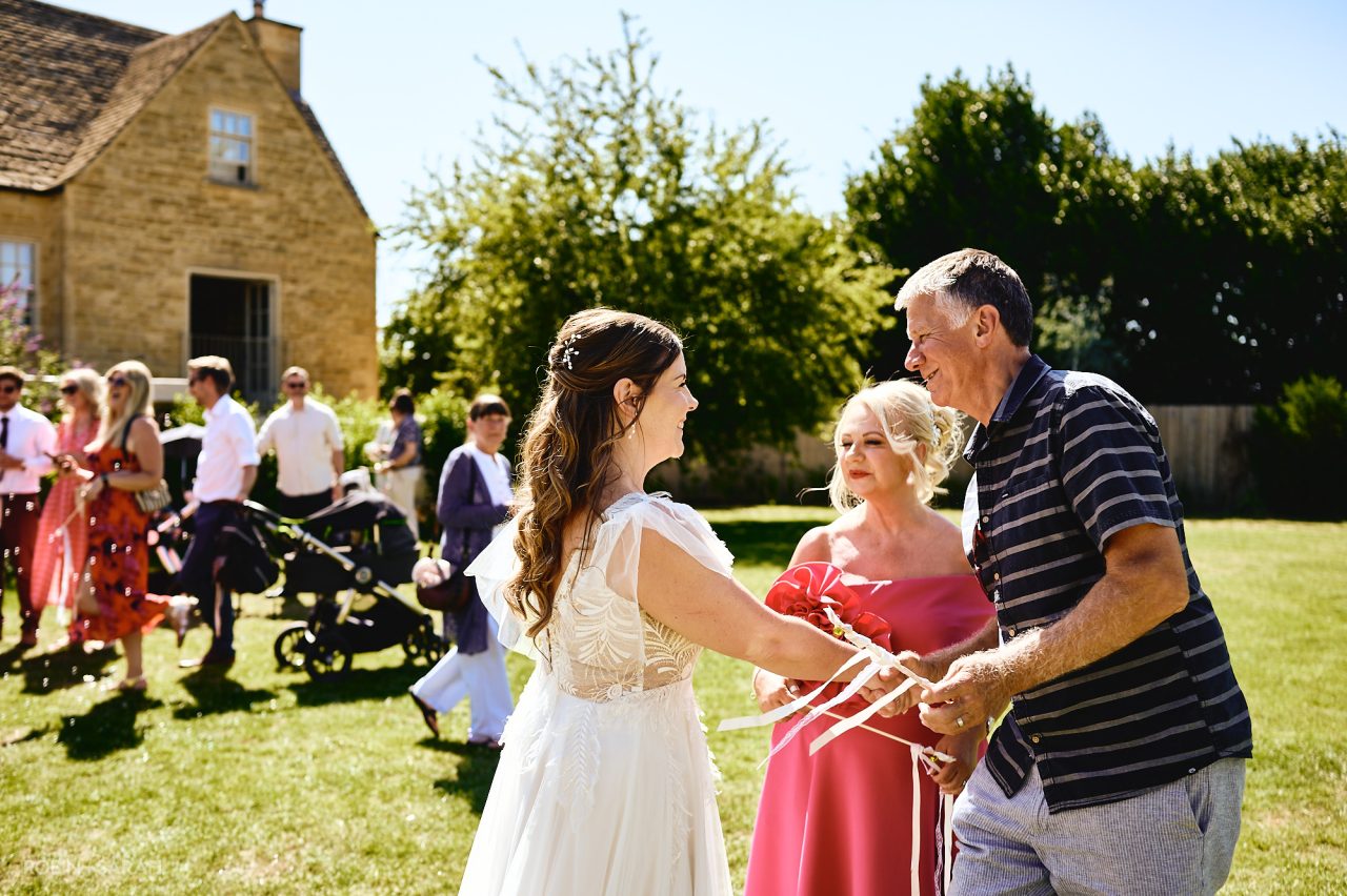 Bride congratulated by wedding guests