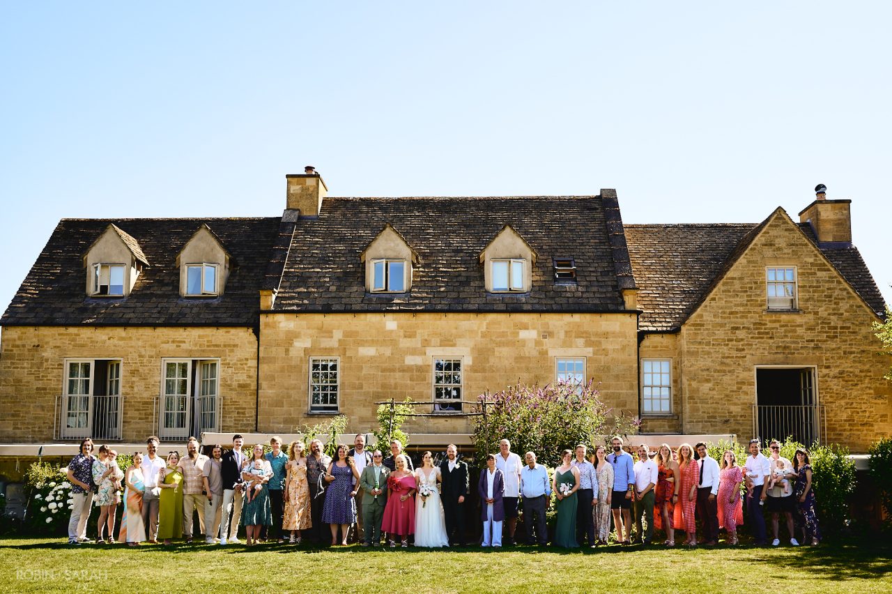 Wedding group photo at Charingworth House in the Cotswolds