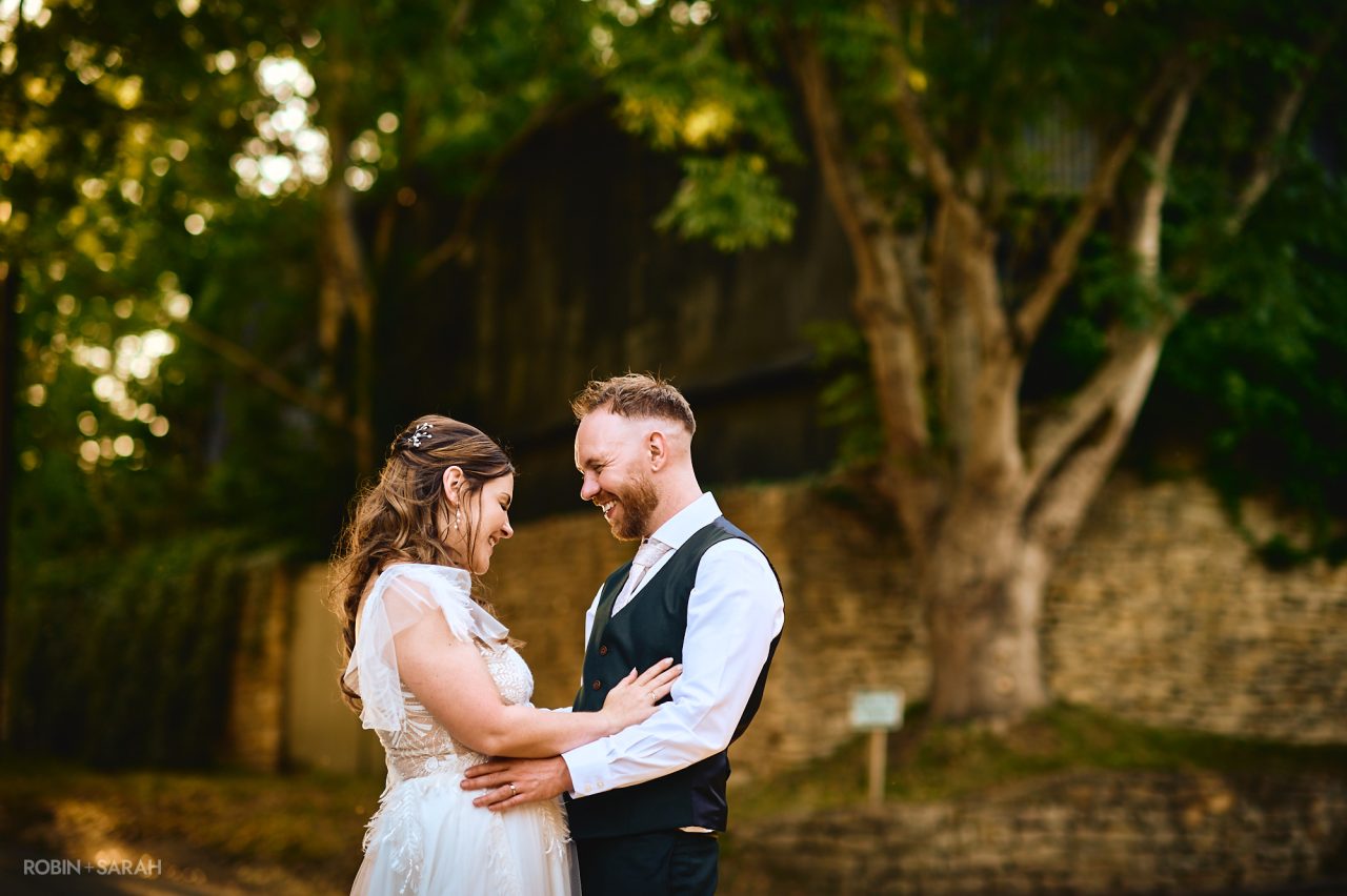 Couple outside Charingworth House and enjoying a quiet moment together