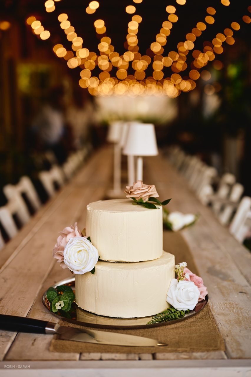 Wedding cake in the pergola at Charingworth House