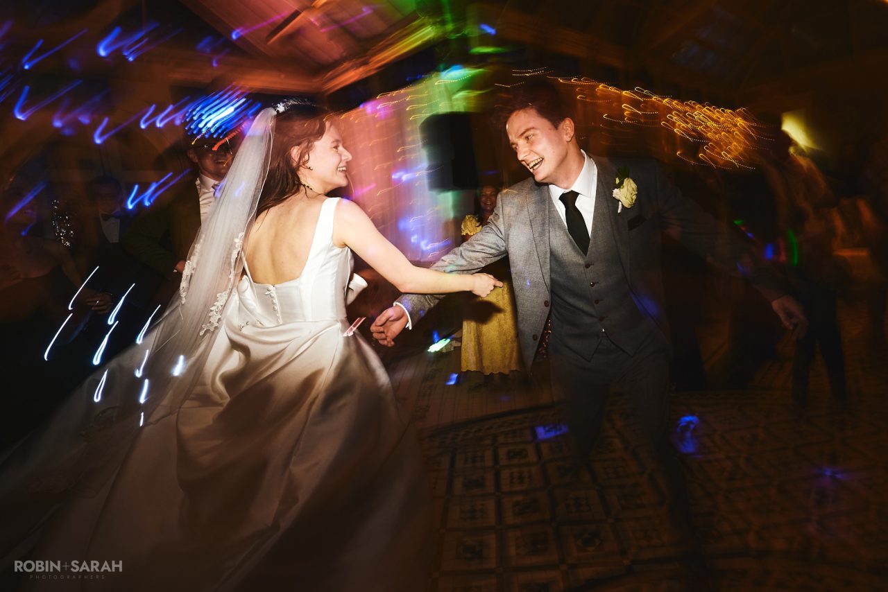Bride and groom on dancefloor during their wedding party at Kilworth House