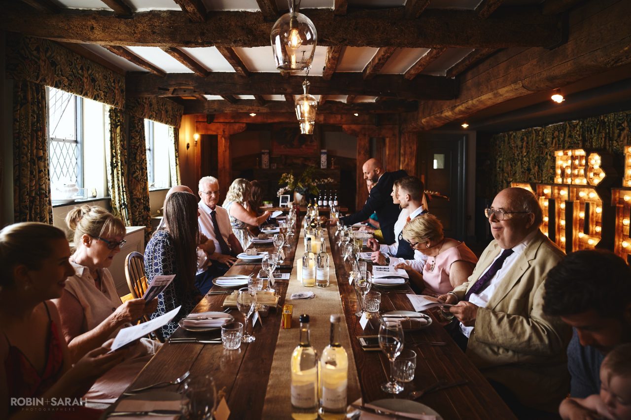 Wedding guests sit down for meal at The Woodsman restaurant in Stratford-upon-Avon
