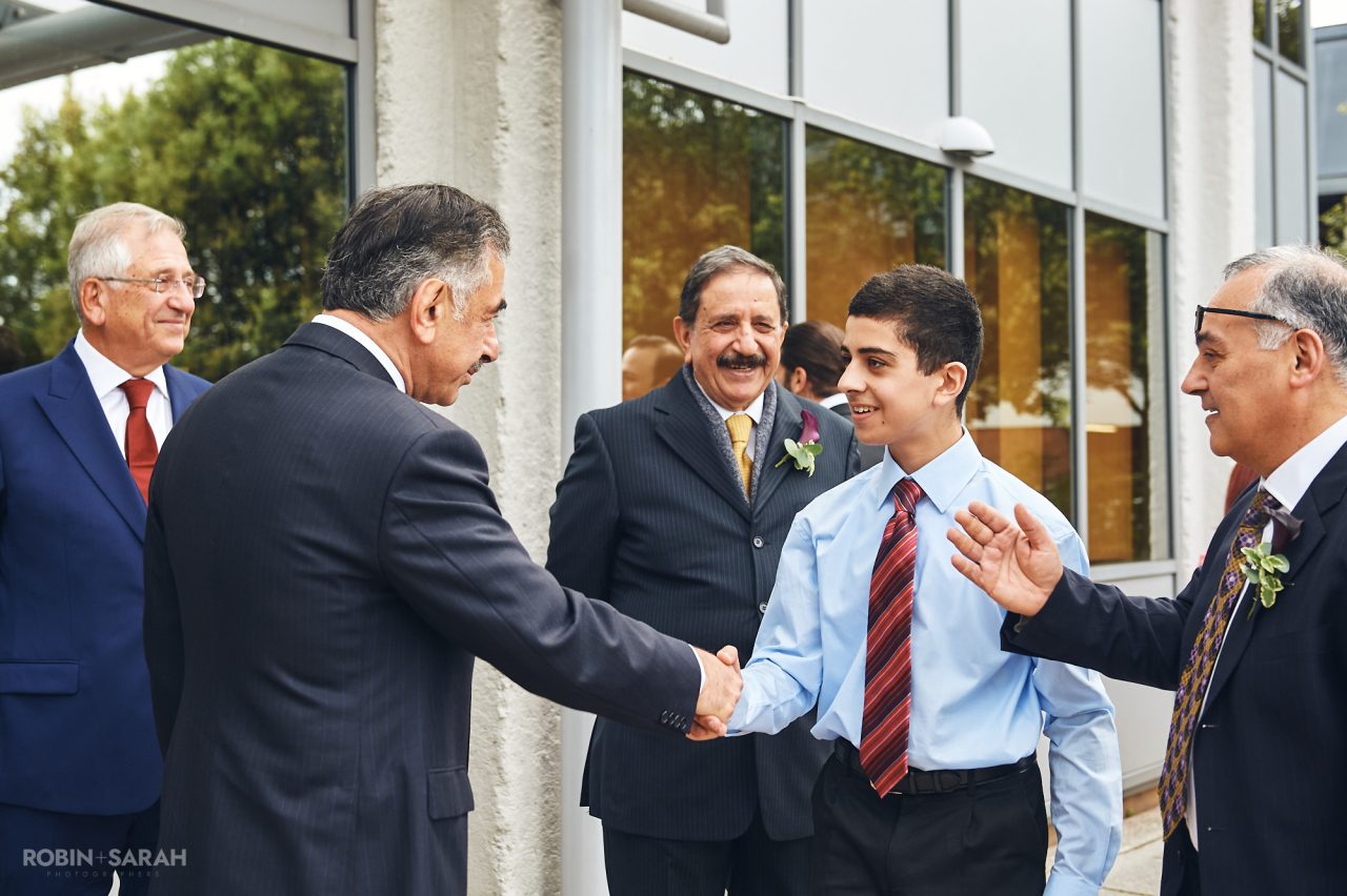 Wedding guests arrive at Solihull Register Office