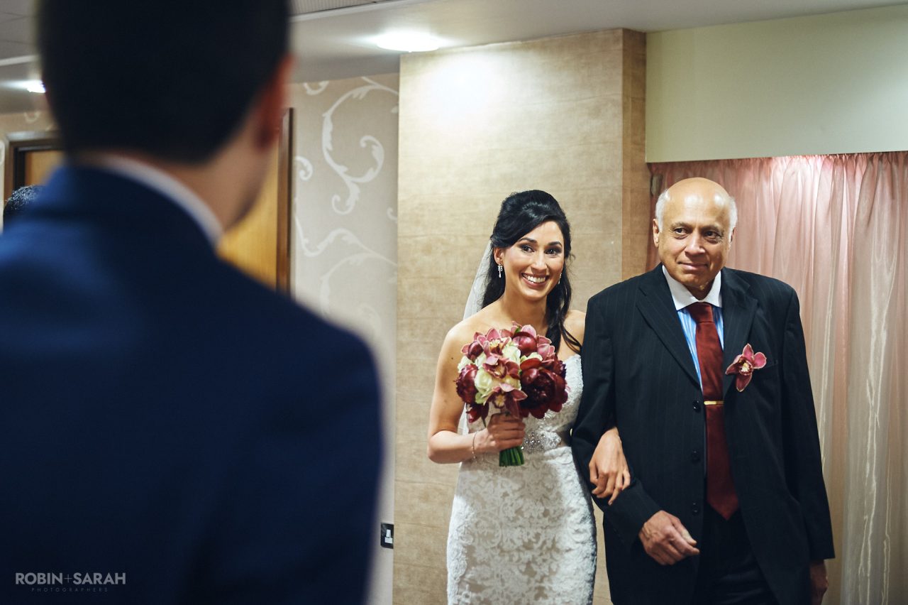Bride and father enter Ceremony Suite at Solihull Register Office