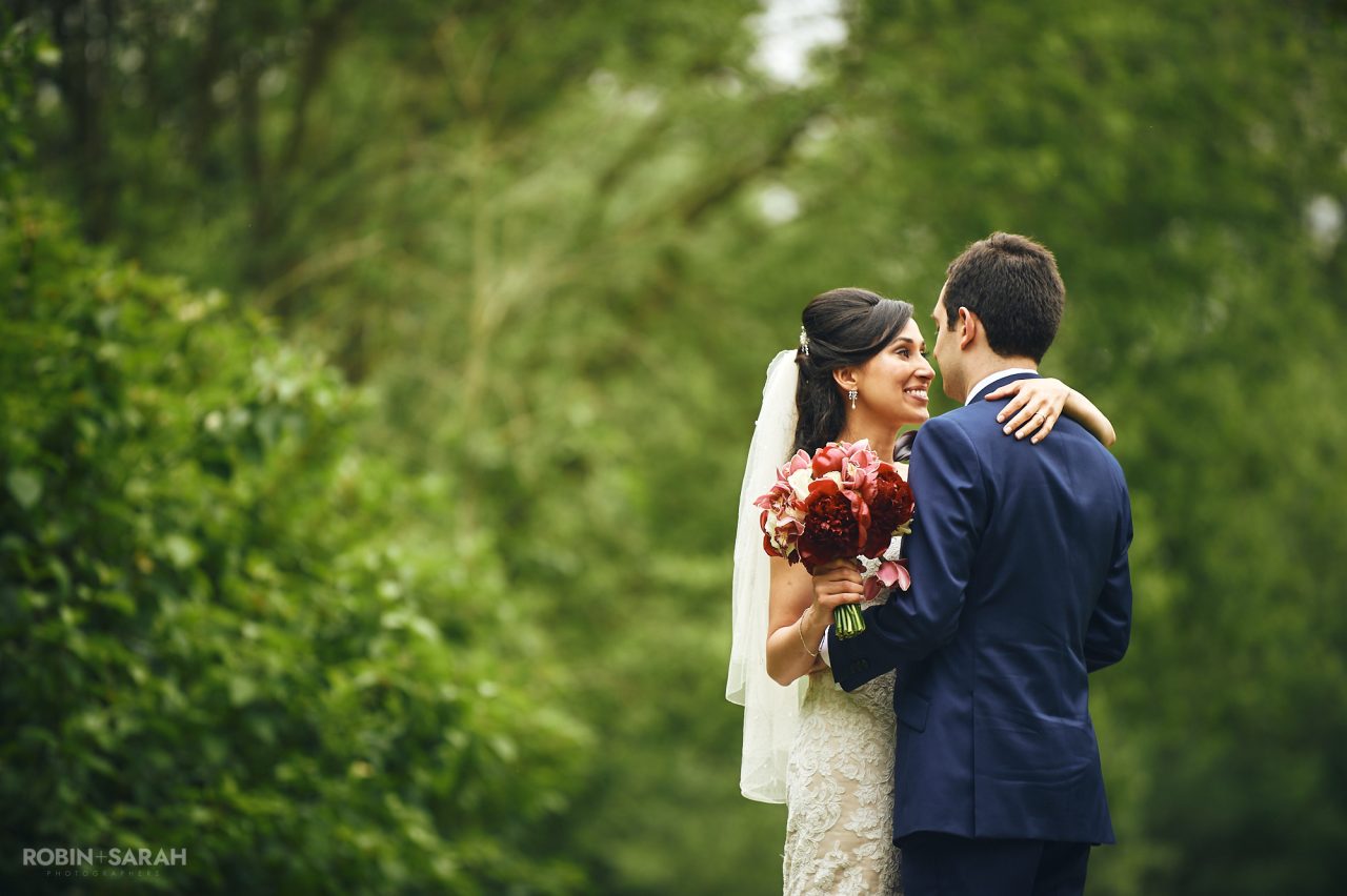 Bride and groom enjoy some quiet time together in Brueton Park, Solihull